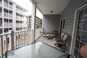 Ocean Blue Vacation Condo, Myrtle Beach - Upper Balcony with hammock, table four chairs